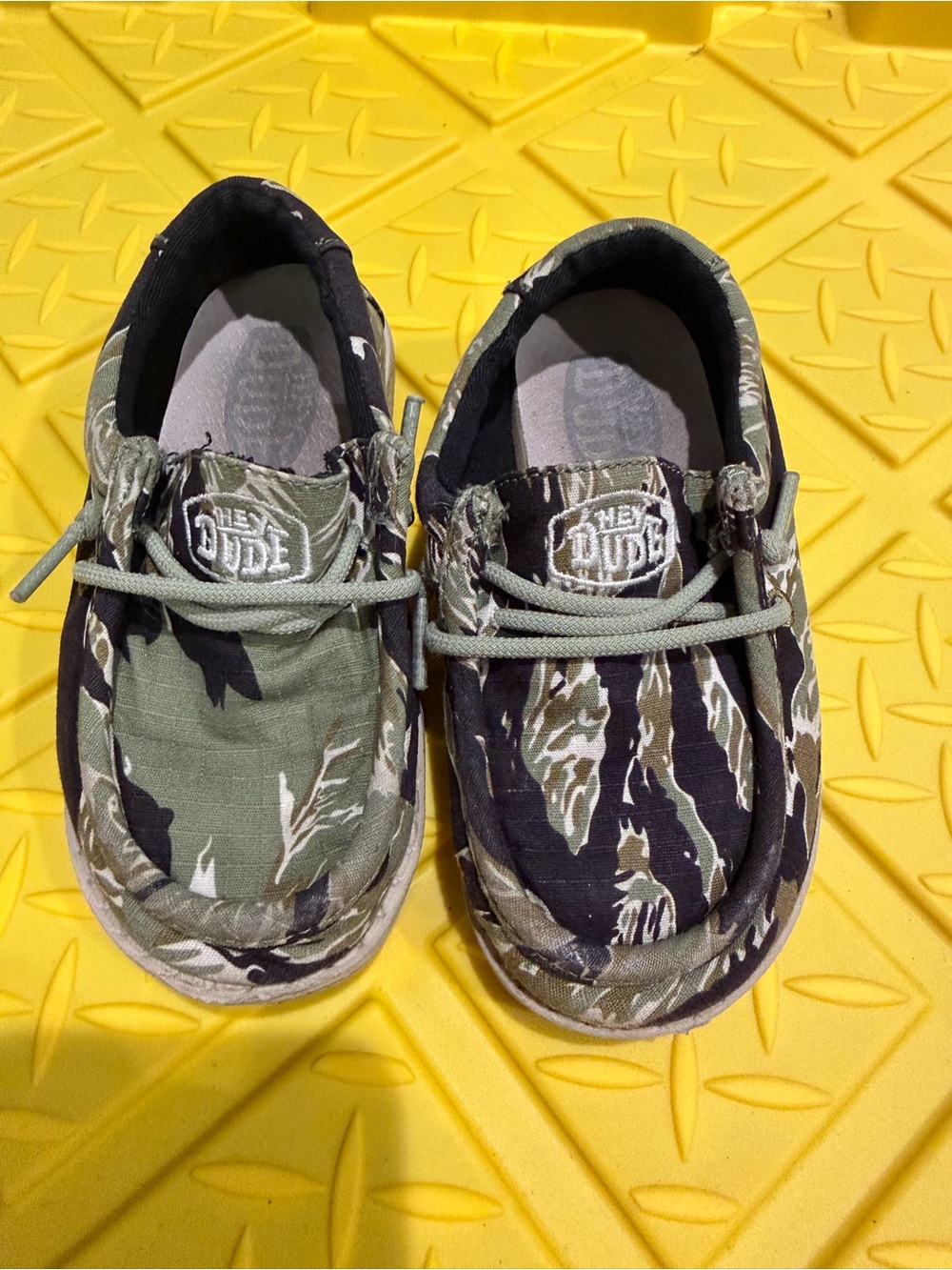 Hey Dude Kids Camo Slip-On Sneakers in Olive Green and Black